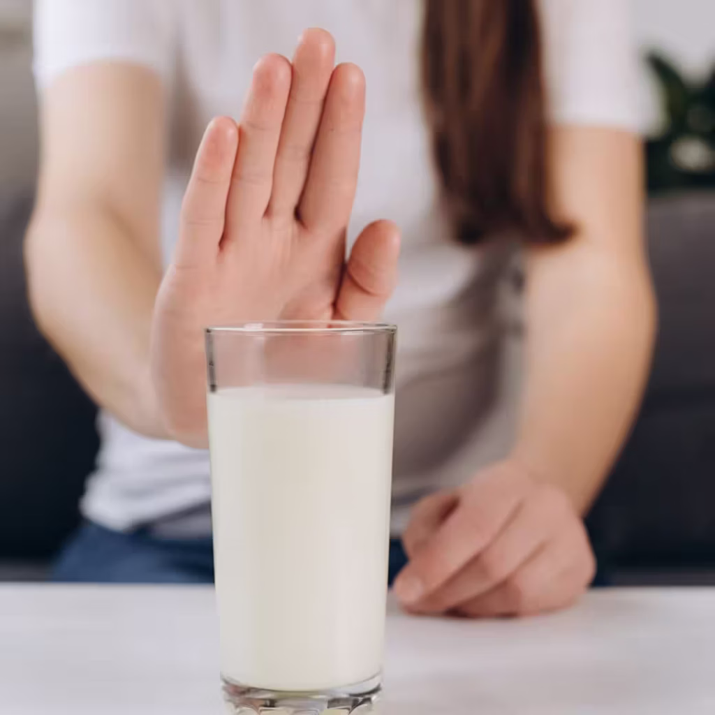 mano que dice no a la leche